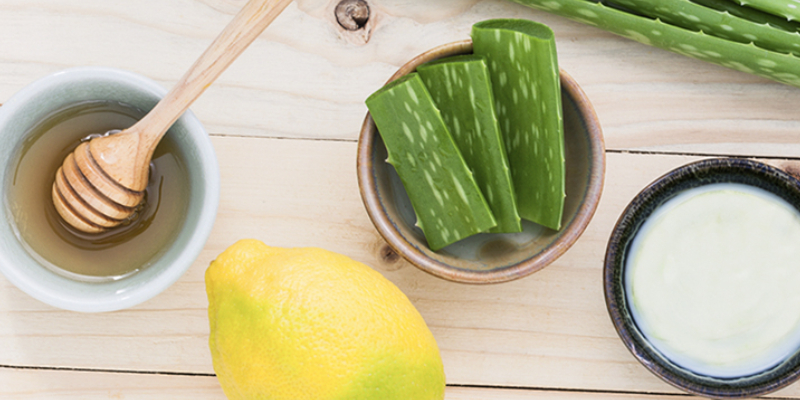 Various Bowls Contains Aloevera, Honey & Curd Placed On The Table - Skin Care Home Remedies