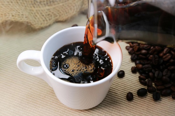 A Dark Brown Coffee - Reduce Intake Of Caffeine During Pregnancy.