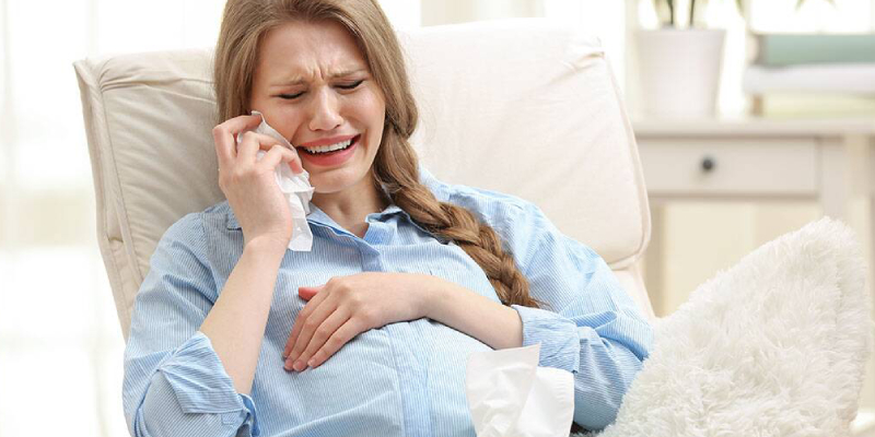 A Woman Crying During Her Pregnancy Time.