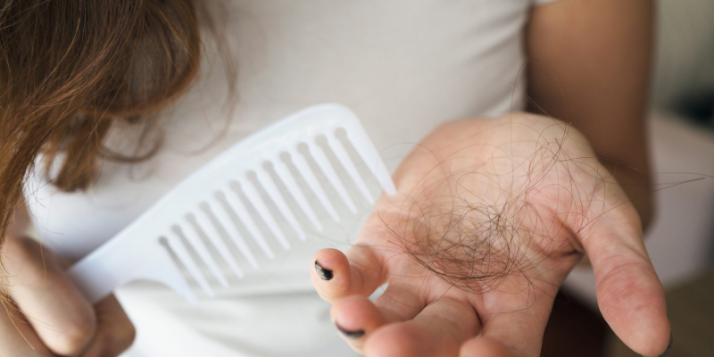 A Woman Having Hair Loss.