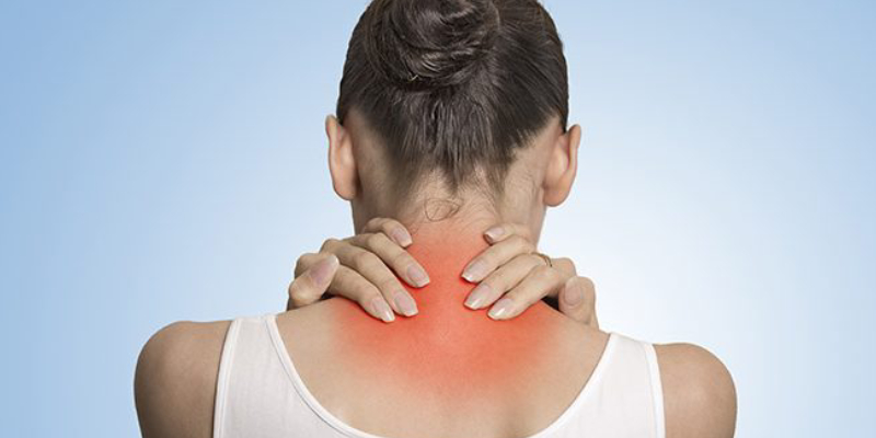 A Woman With Severe Back Neck Pain.