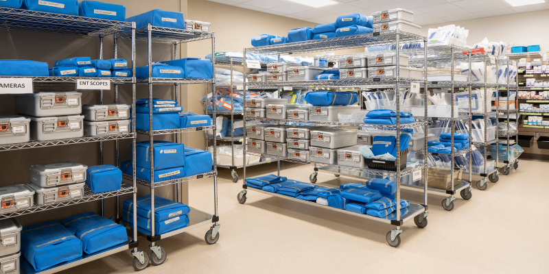 A number of medical storage racks are there with medical equipments arranged on it